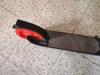 Patinete infantil negro y naranja