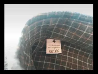 Camisa gris de cuadros de Sportmen.