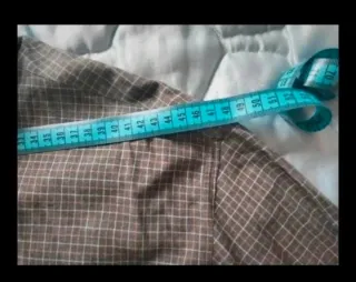 Camisa gris de cuadros de Sportmen.