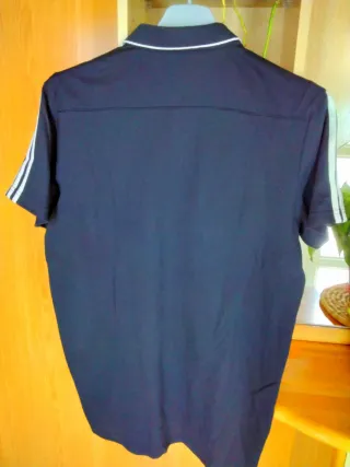 Polo Adidas Heretics.