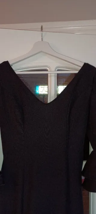 Traje de flamenca negro con volantes