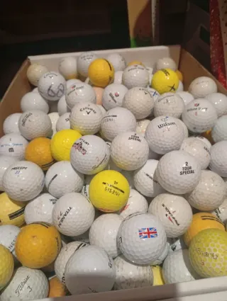 250 pelotas de golf variadas