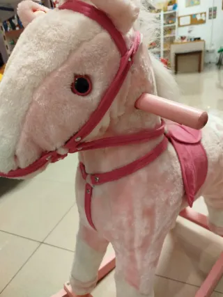Caballo balancín rosa