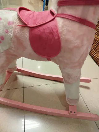 Caballo balancín rosa