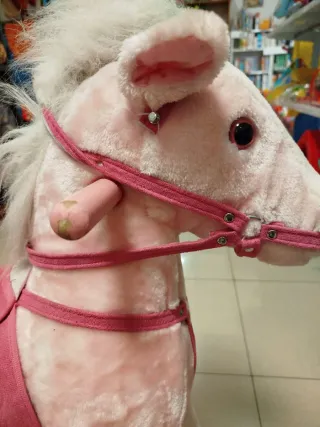 Caballo balancín rosa