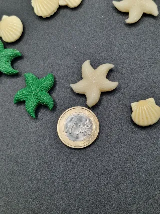 Lotto ciondoli conchiglie e stelle marine