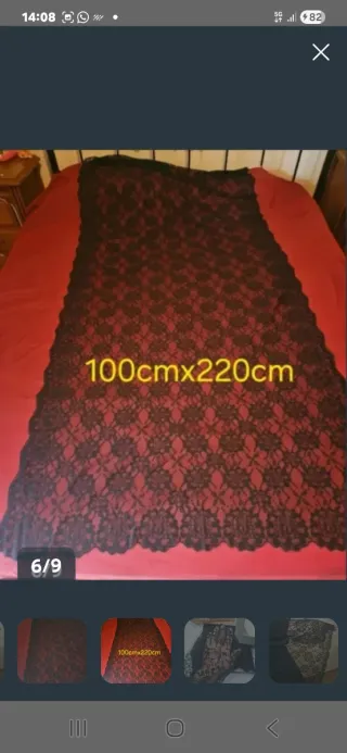 Mantilla negra, broche y guantes de encaje