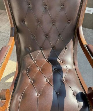 Poltrona a dondolo in pelle e legno