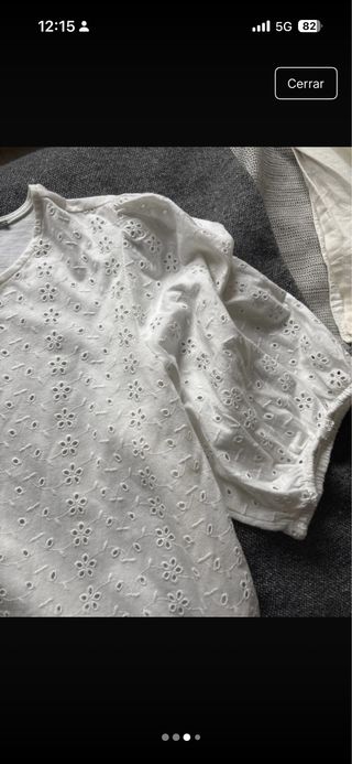 Camisa corta troquelada blanca y manga abullonada