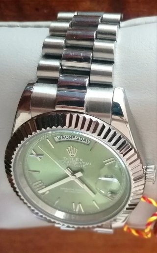 Orologio Verde Acciaio.