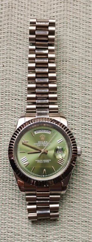 Orologio Verde Acciaio.