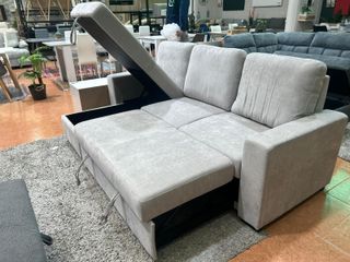 Sofá cama modular gris con arcón