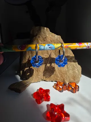 Pendientes intercambiables estrella y flor