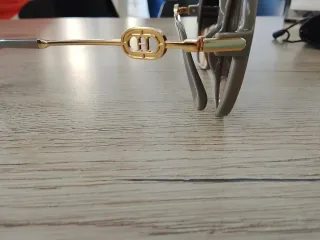 Gafas Carolina Herrera Doradas y Grises