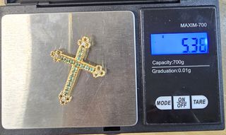 Cruz de oro de 18k. Peso: 5.00 gr