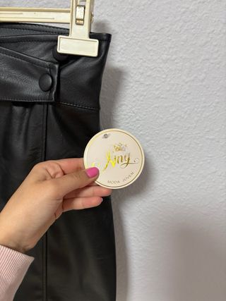 Falda mini polipiel negra talla S