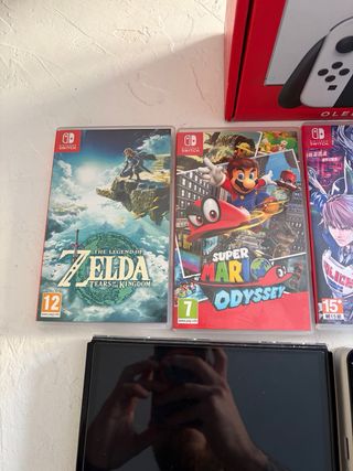 Nintendo Switch OLED Bianca + Giochi e accessori