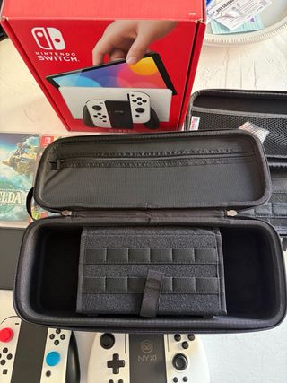 Nintendo Switch OLED Bianca + Giochi e accessori