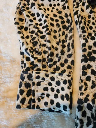 Blusa estampada manga larga