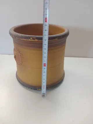 Maceta de cerámica con sol