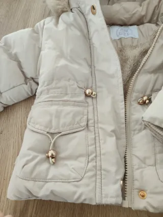 Piumino neonata con cappuccio e pelliccia