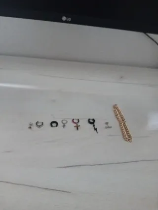 Pulsera oro y 7 pendientes