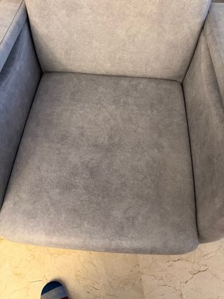 Sillón reclinable de tela gris