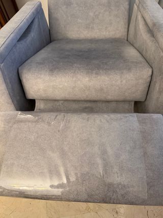 Sillón reclinable de tela gris