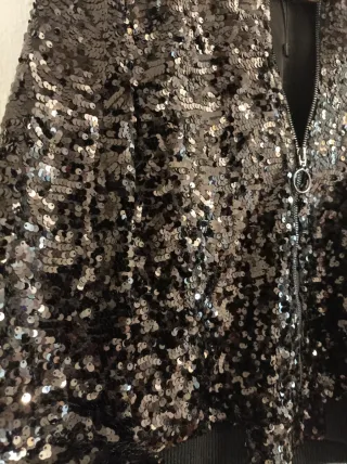 Chaqueta lentejuelas negra y plateada