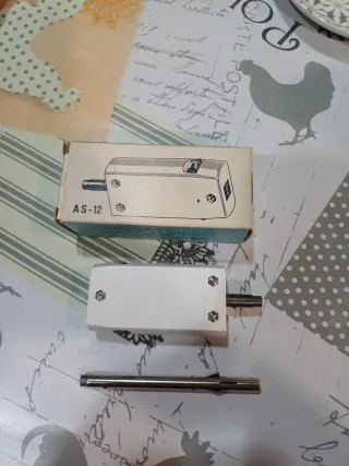 Adaptador para dispensador de discos