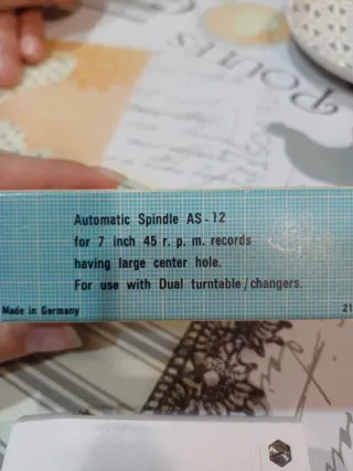 Adaptador para dispensador de discos