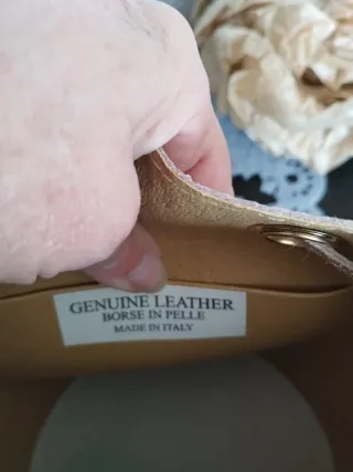 Bolso bombonera efecto trenzado en color Rosa