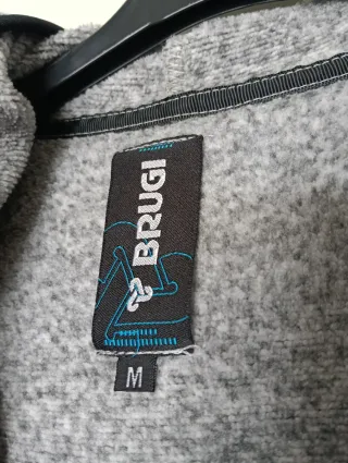 Felpa grigia con zip fucsia