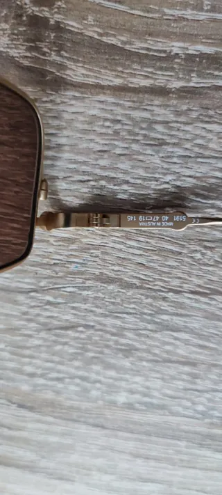 Occhiali da sole Carrera oro e marroni