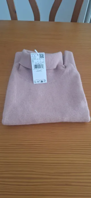 Chaleco de punto cuello alto rosa talla M