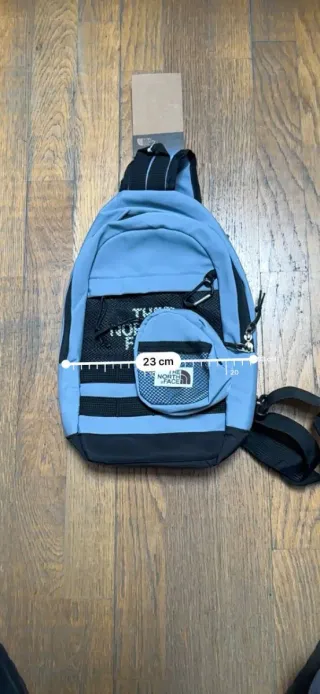 Mochila Sling Bag The North Face Azul y Negro