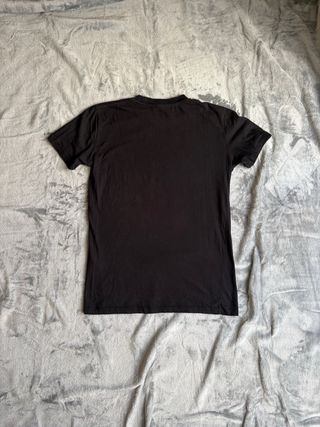 T-shirt Gucci nera con logo oro