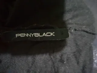 Top nero collo alto con paillettes