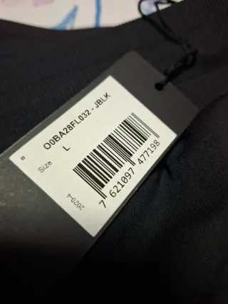 Pantalón chándal Guess negro con detalles rosa