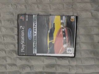 Consola PlayStation 2 + Volante e Giochi