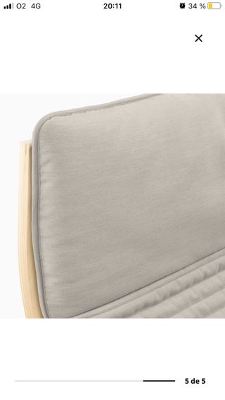 Sillón Poang madera y tela beige.