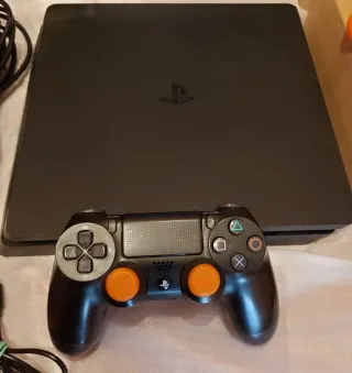 PlayStation 4 Slim, 1TB + mando