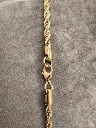 Colgante León Acero Quirúrgico Bañado en Oro