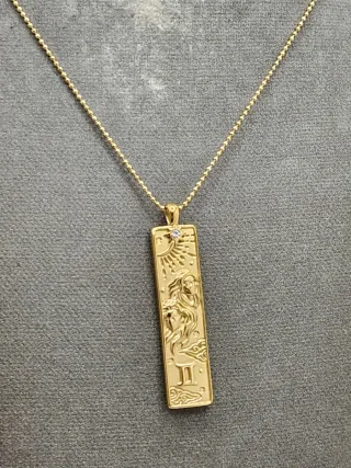 Colgante Géminis Acero Quirúrgico Baño Oro