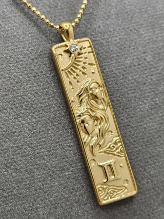 Colgante Géminis Acero Quirúrgico Baño Oro