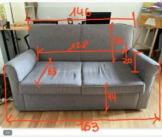 Sofá cama gris de tela