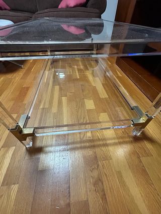 Mesa de cristal y metal dorada