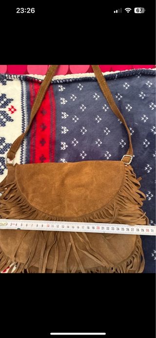 Bolso bandolera de piel con flecos