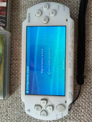 PSP 1004 Blanca + 4 Juegos + Accesorios