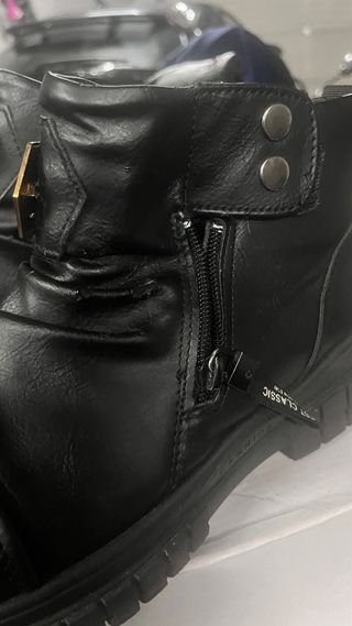 Botas negras con cremallera